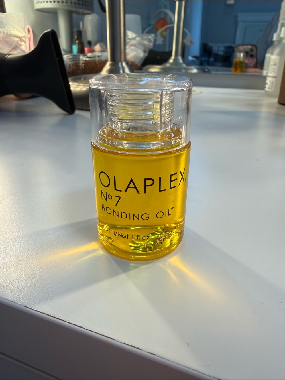 OLAPLEX No.7 Bonding Oil — Transparent Bottle with Yellow Oil
